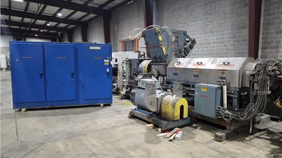 Used pneumatic ram stuffer force feeder on plastic extruder for feeding low bulk density film scrap and regrind
