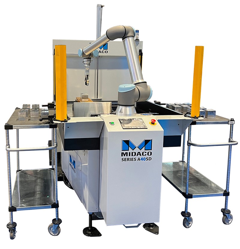 Midaco Automatic Pallet Changer with UR Cobot Robot arm transfering parts from side carts onto the pallet changer shuttle