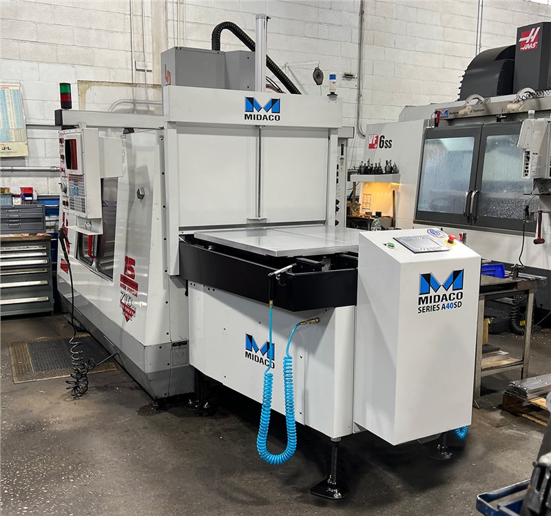 New Midaco Automatic Pallet Changer on older Haas VF3 Vertical Machining Center in machine shop