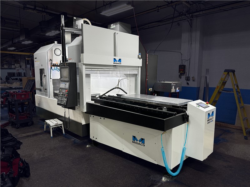 Midaco A6025SD Automatic Pallet Changer on Okuma Genos M660V