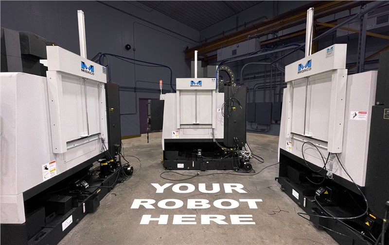 Midaco Robot Access Doors on VMC positioned for one robot to access 3 mill Midaco Robot Access Doors on VMC positioned for one robot to access 3 mill