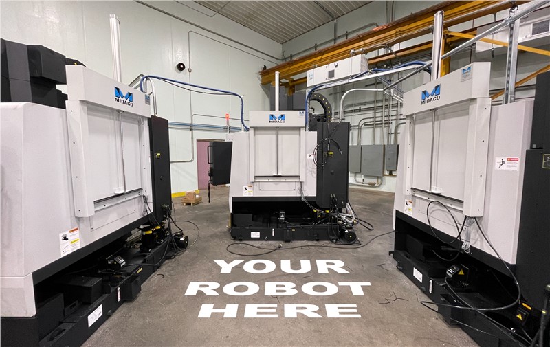 Midaco Robot Access Doors on VMC positioned for one robot to access 3 mill Midaco Robot Access Doors on VMC positioned for one robot to access 3 mill
